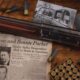 Le Browning Auto-5 Whippet de Clyde Barrow pose sur un journal de 1934 annoncant la mort du couple